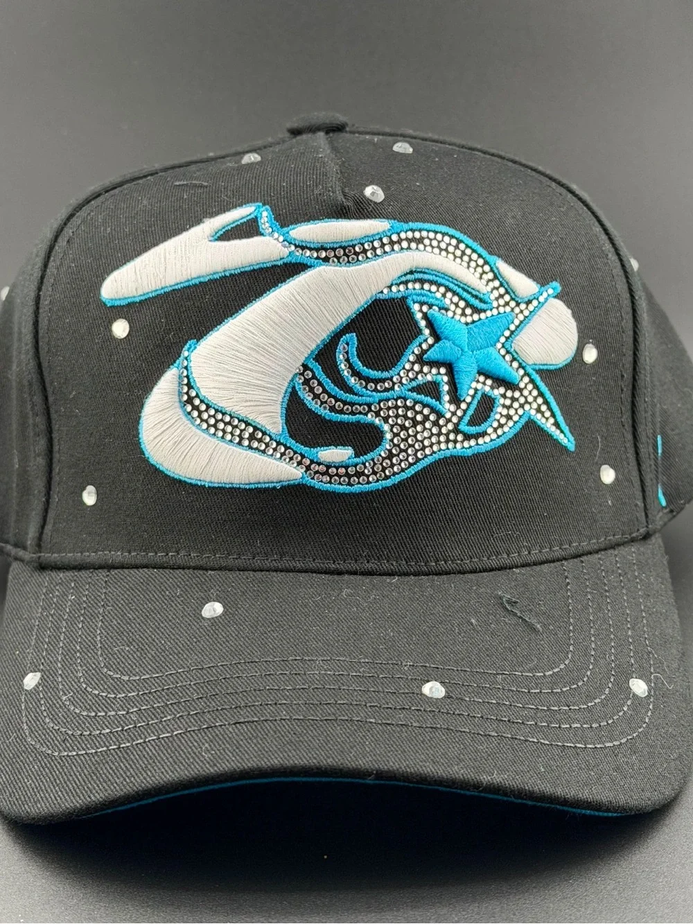 Black Baseball Cap with Blue & White Star Accent
